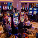 Players enjoying the thrilling slot machines at 32win casino, celebrating wins with excitement.